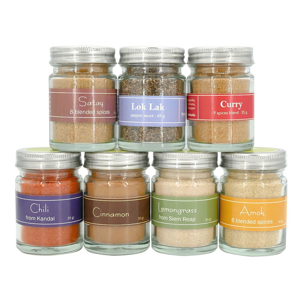 Spices in small glass pot, all