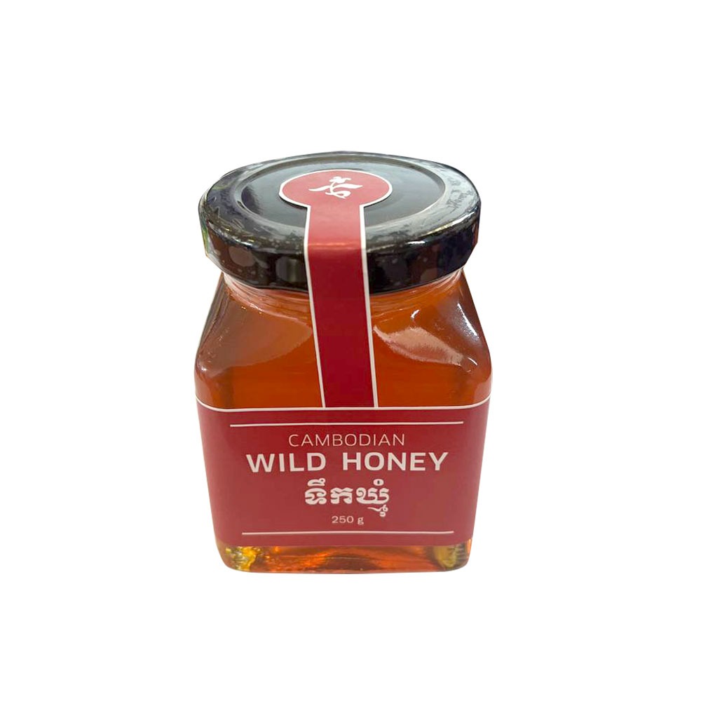 Wild honey in glass pot