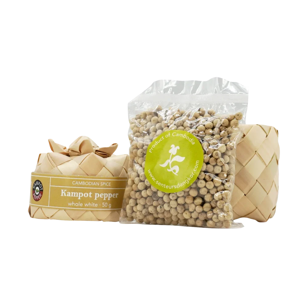 Kampot pepper in sugar palm leaf (smok) box, whole white, displayed