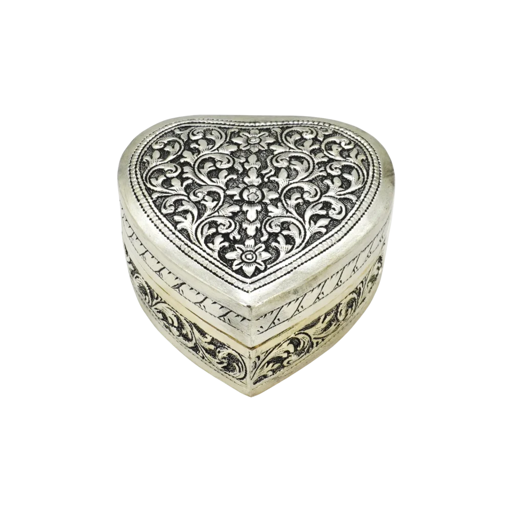 Candle in engraved silver heart shaped box, closed