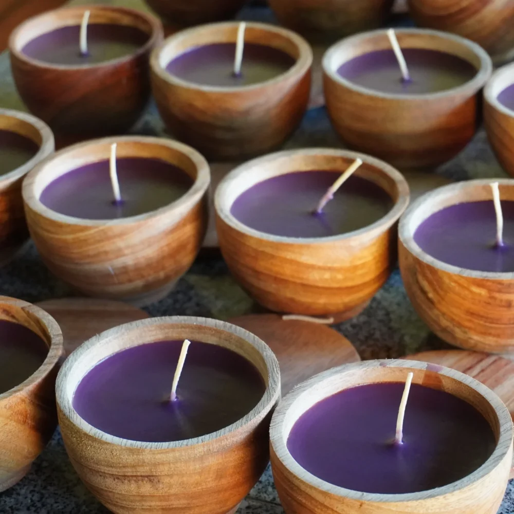 Candle in wood bowl drying, sandalwood scent