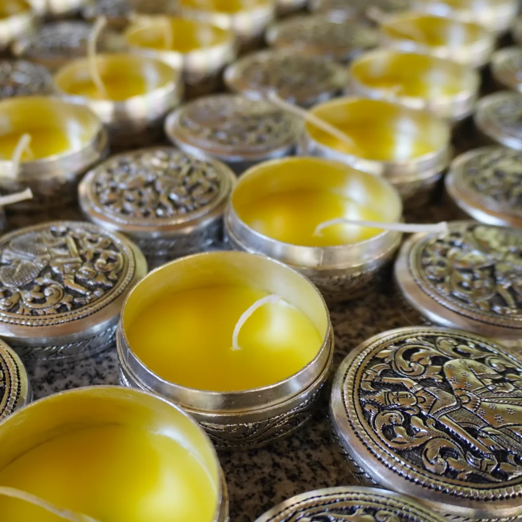 candle making, frangipani scented in silver