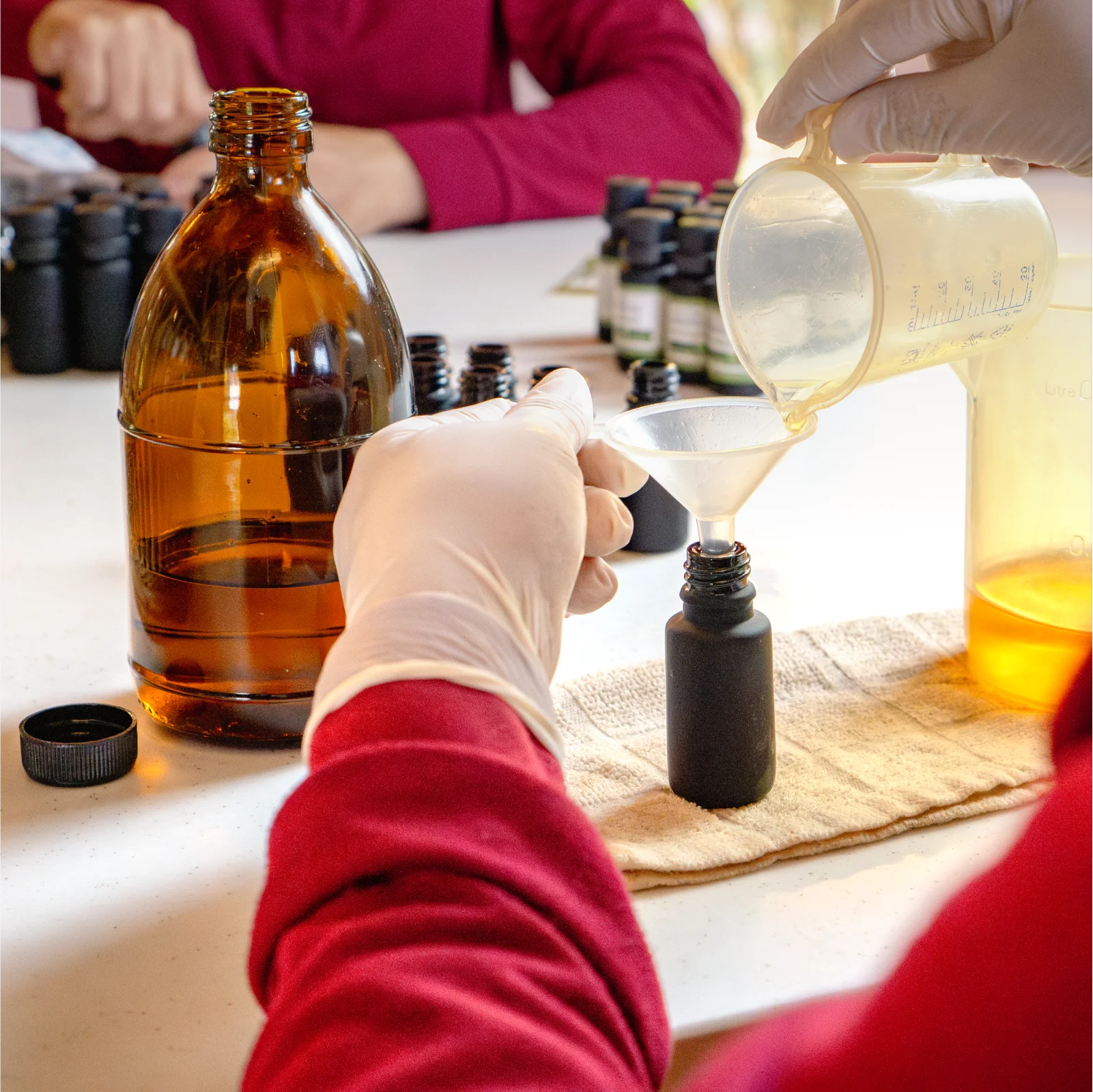 Artisan filling lemongrass essential oil