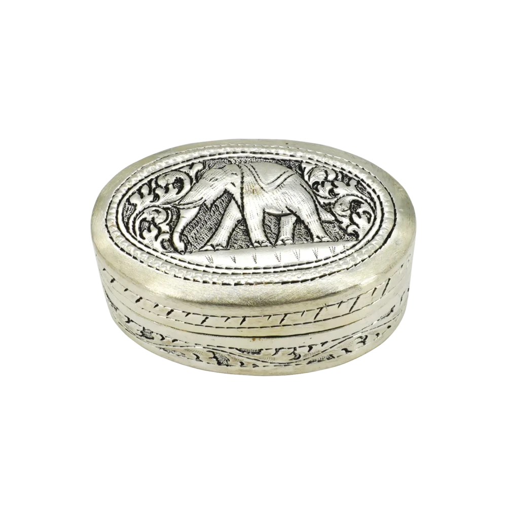 Candle in engraved elephant silver oval box, closed