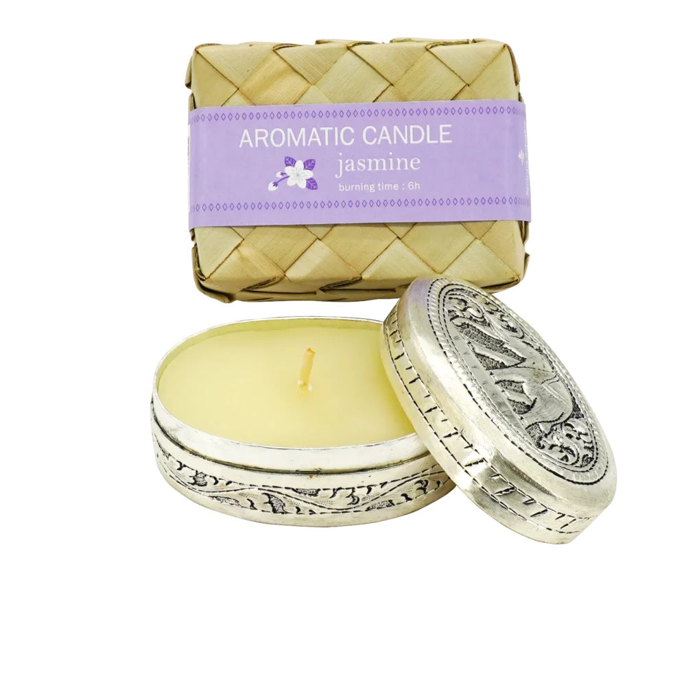 Candle in engraved elephant silver oval box, displayed