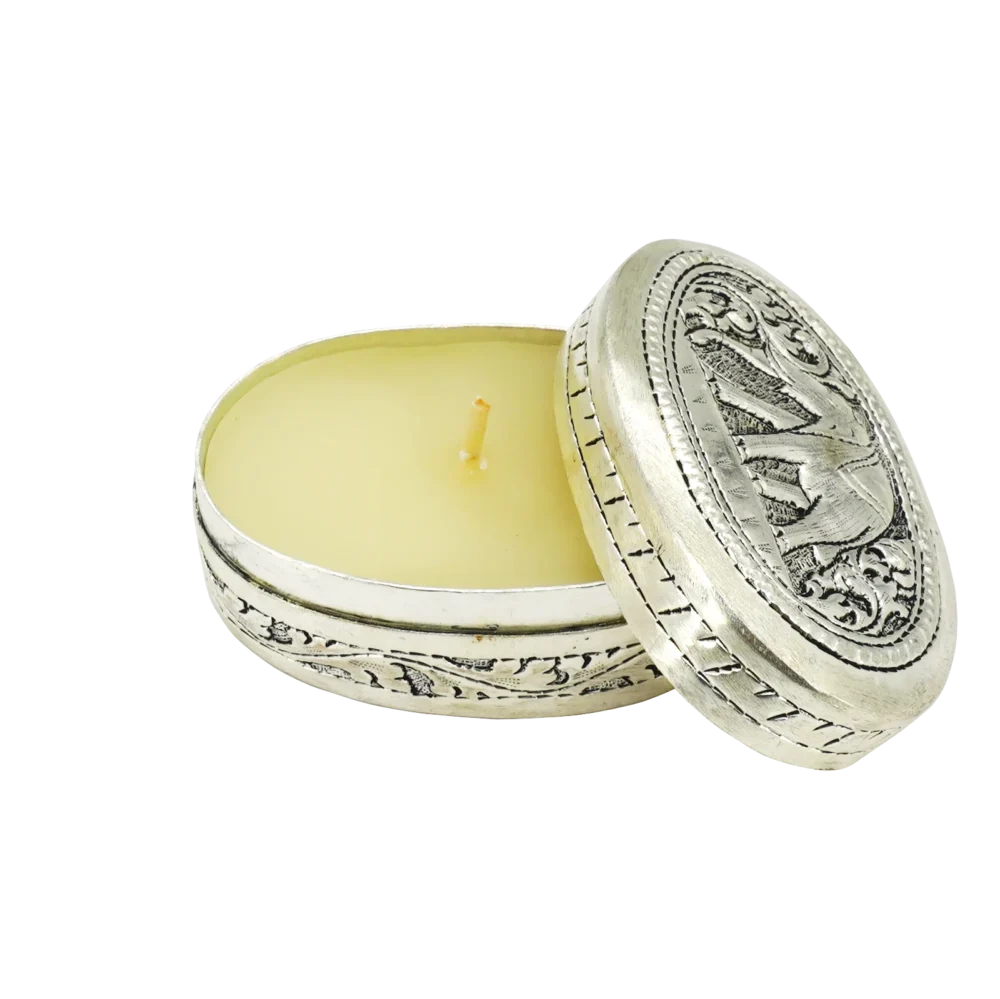 Candle in engraved elephant silver oval box, opened