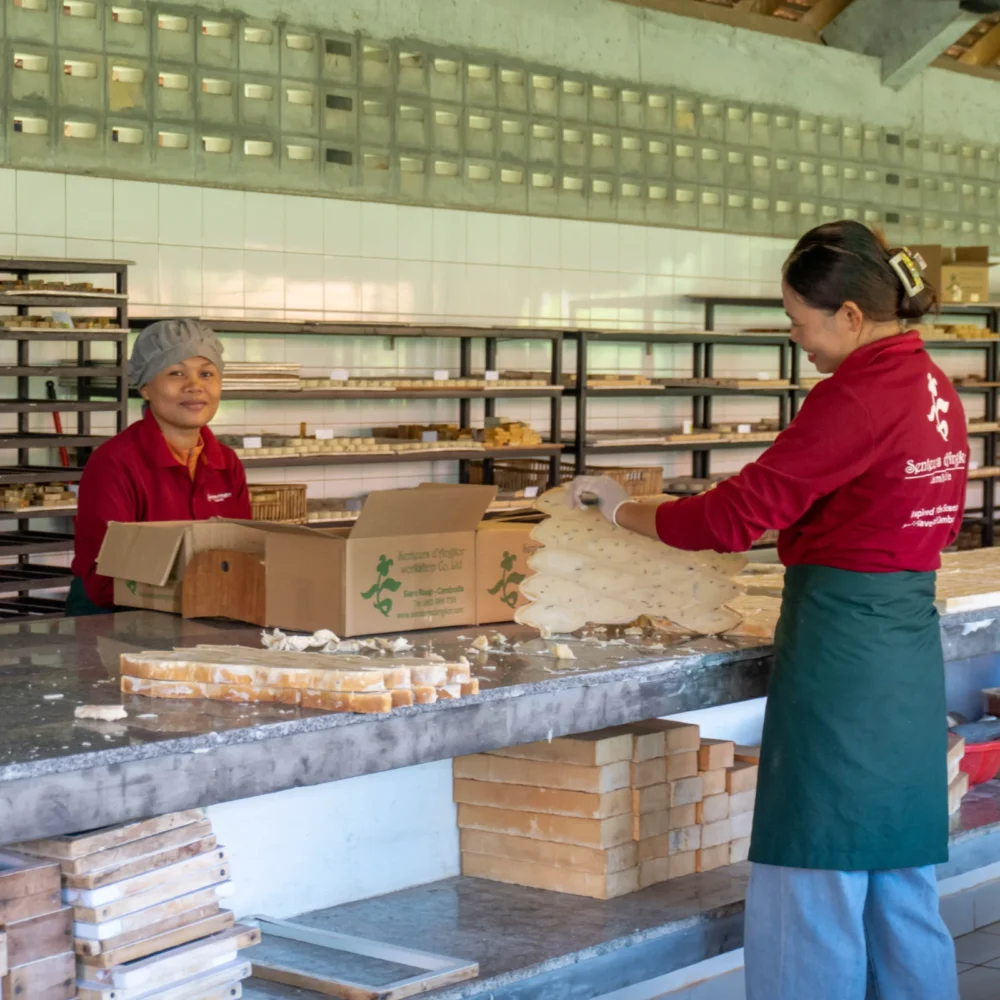 S20 soap making process, artisan cleaning up mould.