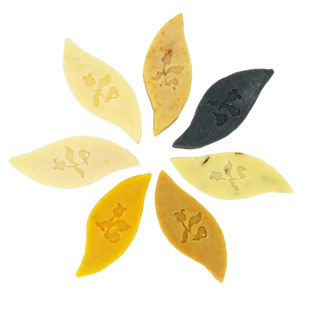 Soap, mango shape in natural sugar palm leaf packaging, all scents presented in a wheel fashion