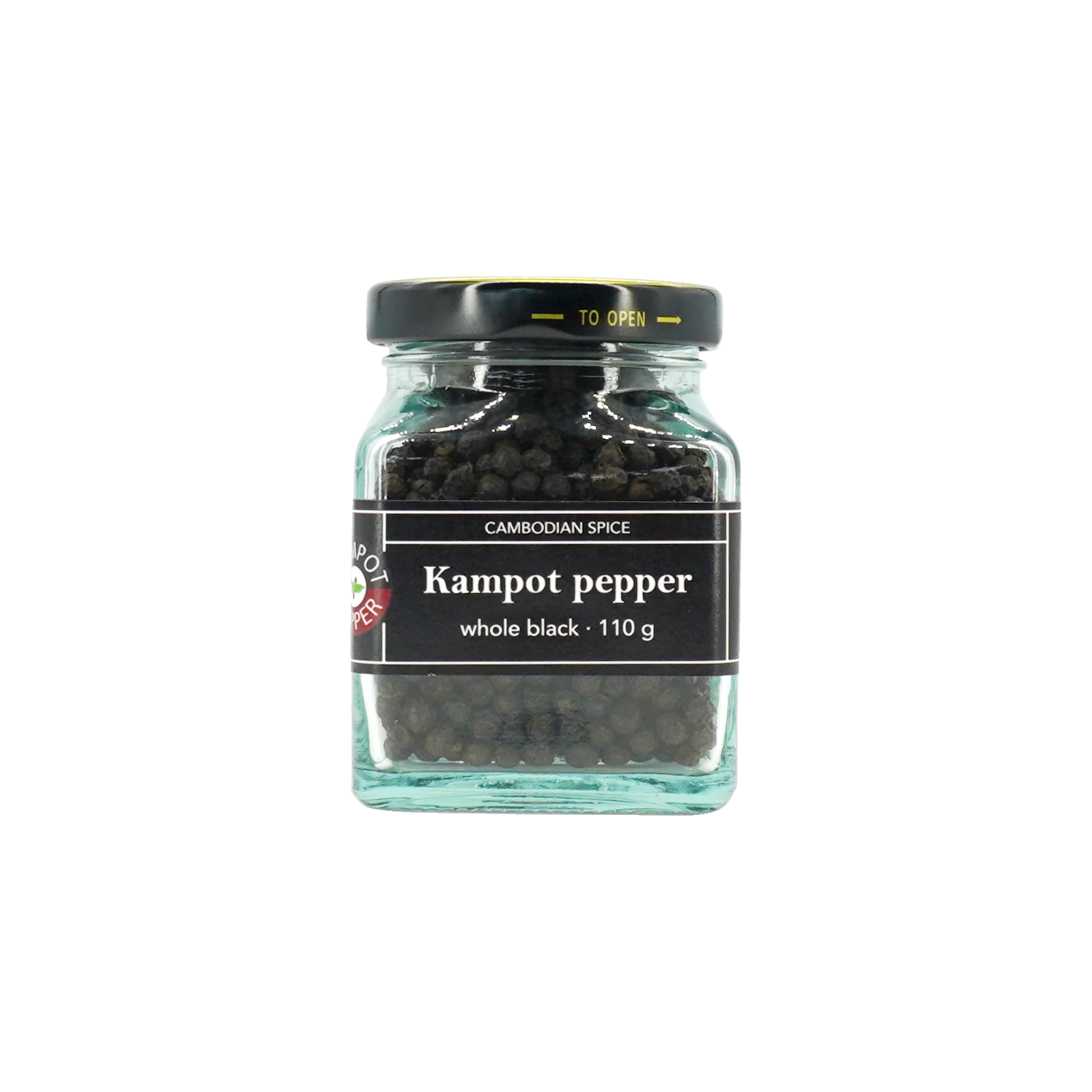 Kampot pepper in big glass jar, whole black