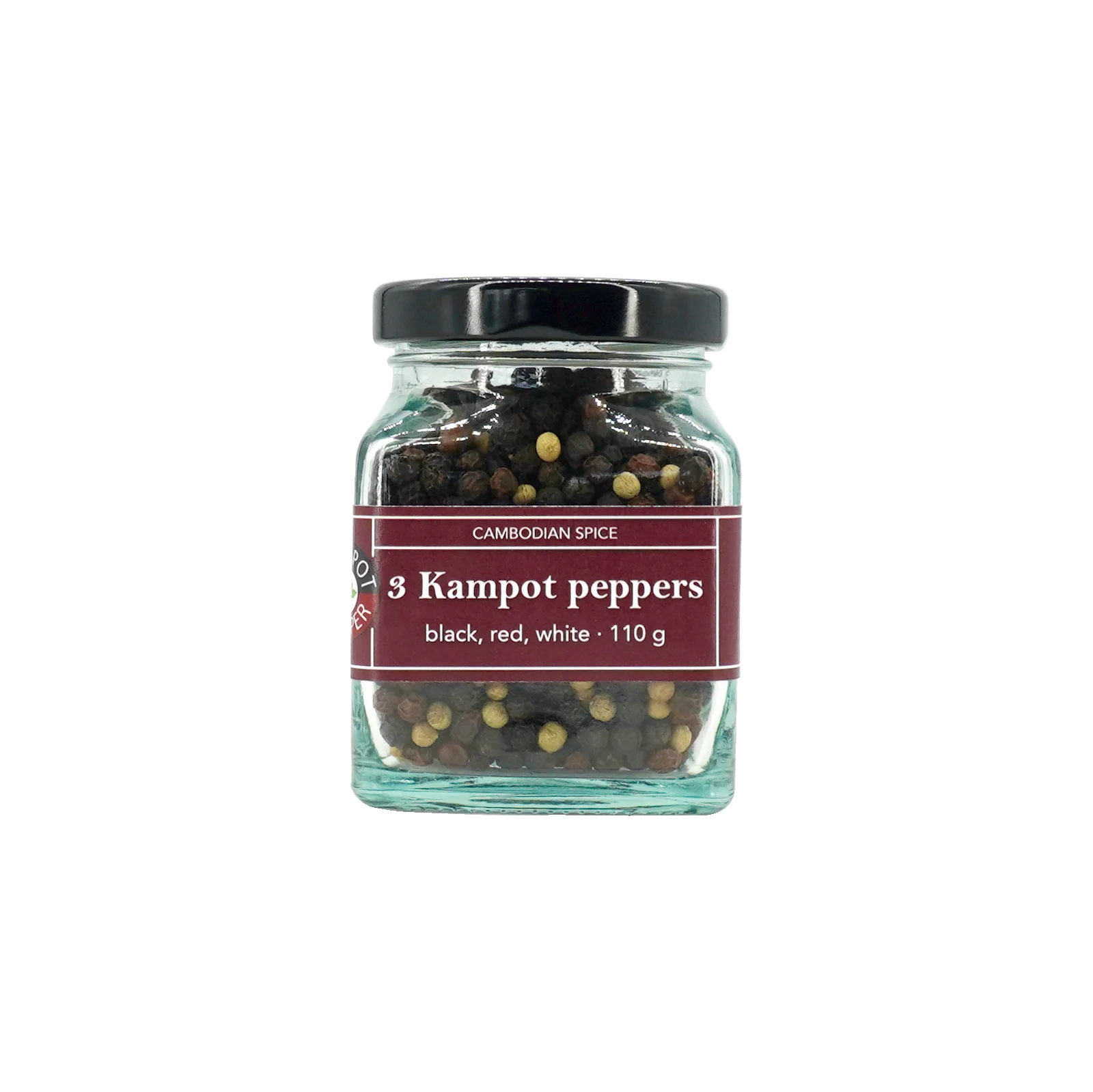 Kampot pepper in big glass jar, whole mixed