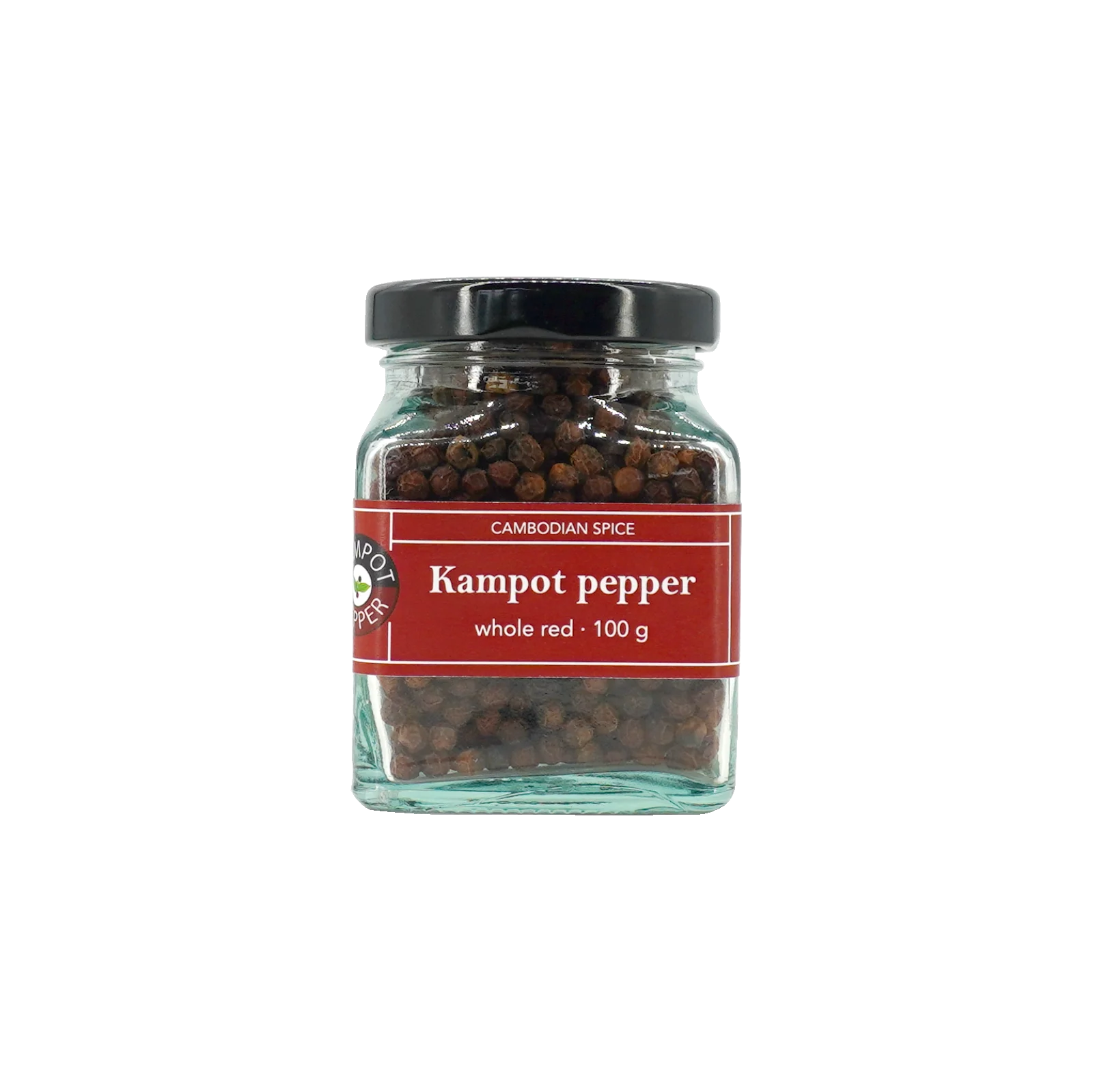 Kampot pepper in big glass jar, whole red
