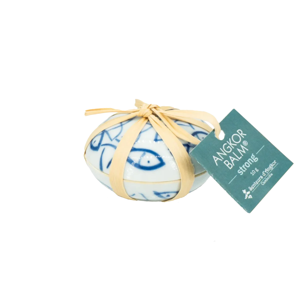 Angkor balm® in white ceramic with a hand drawn fish pattern, packed with natural string and a tag