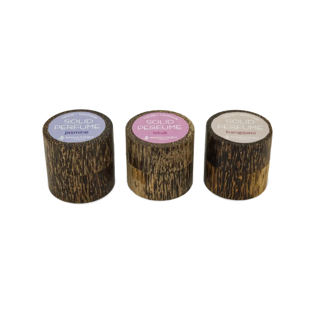 Solid perfume in wood box, in a row