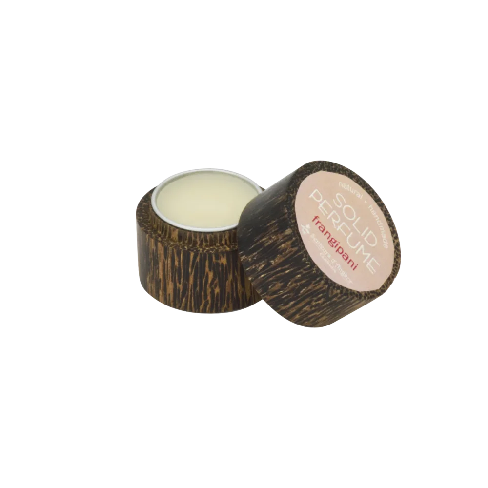 Solid perfume in wood box, frangipani opened