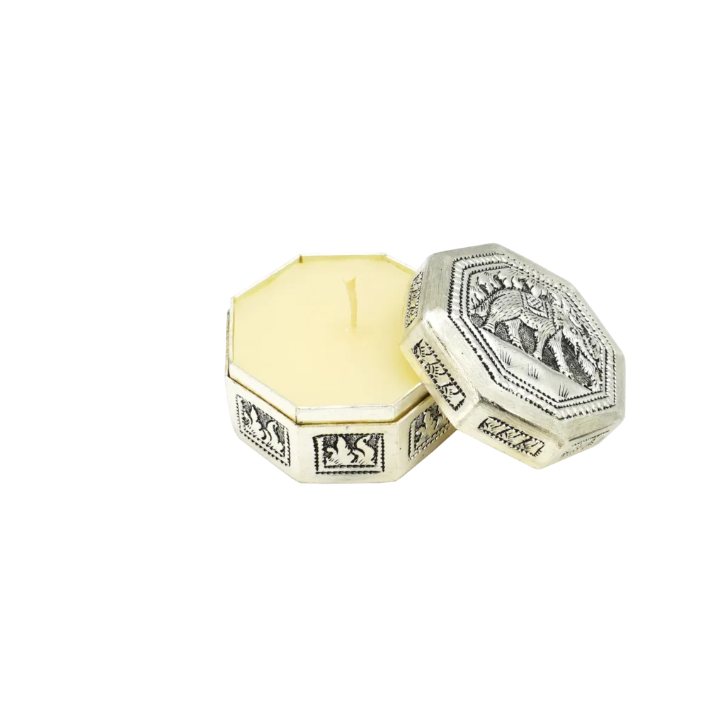 Candle in engraved elephant silver hexagonal box, opened