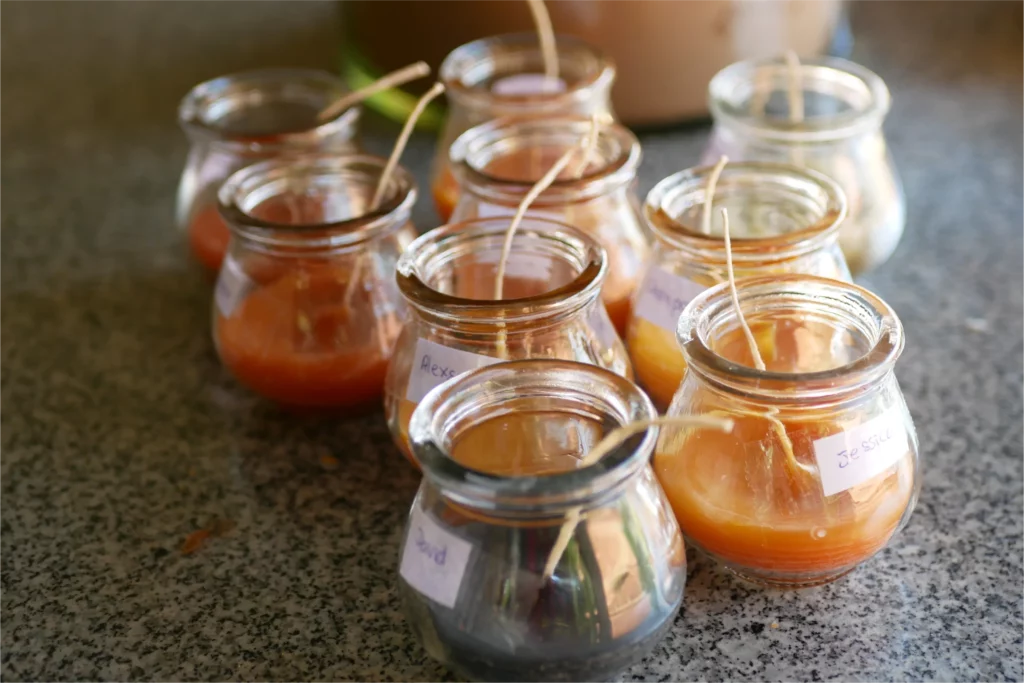 DIY candles made by visitors are waiting to dry before adding a second layer of scent and color.