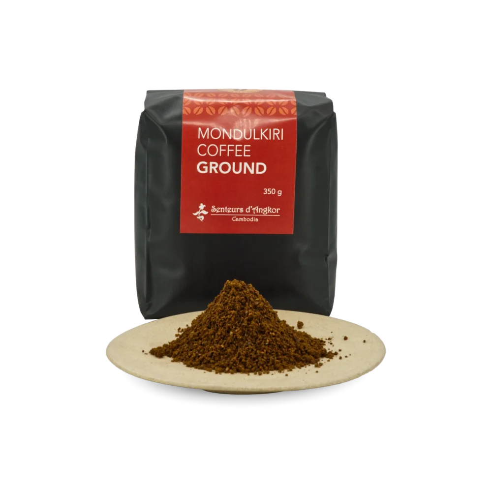 Coffee ground from Mondulkiri in small aluminium pack displayed with ground coffee in plate