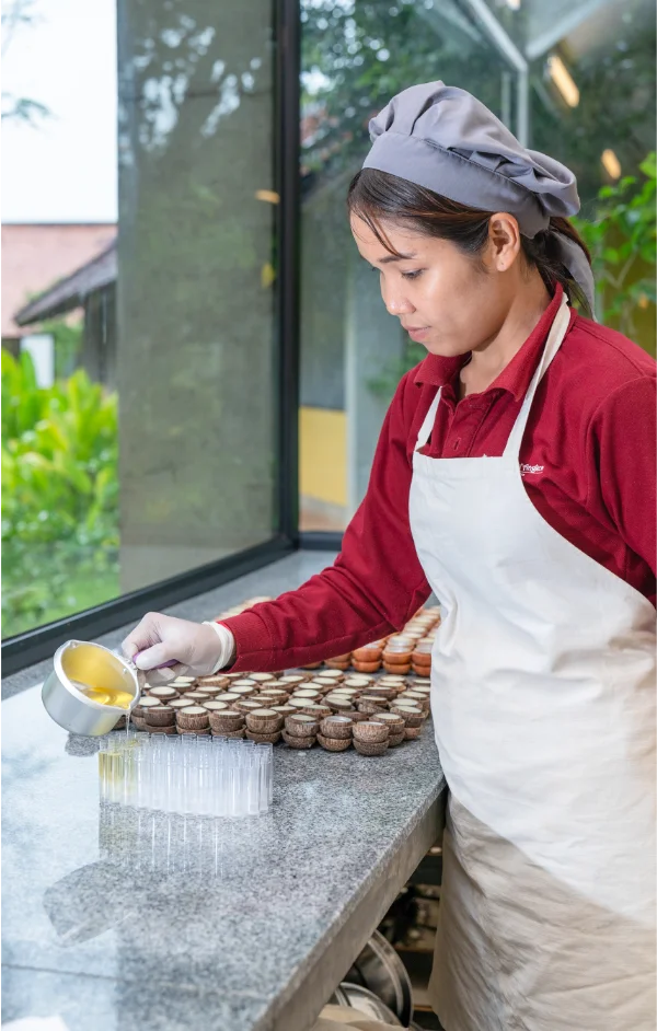 Artisan making recipe at our Workshop laboratory