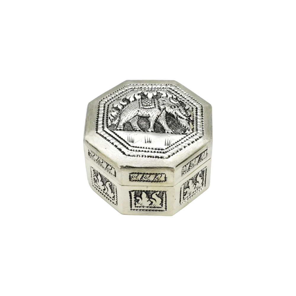 Candle in engraved elephant silver hexagonal box, closed