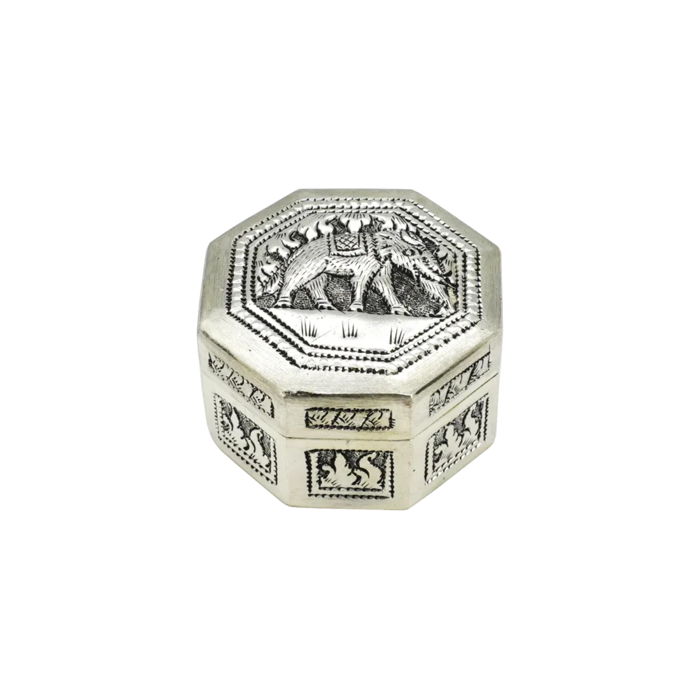 Candle in engraved elephant silver hexagonal box, closed