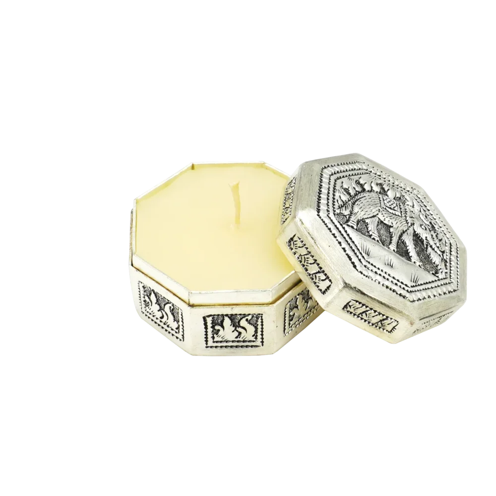 Candle in engraved elephant silver hexagonal box, opened