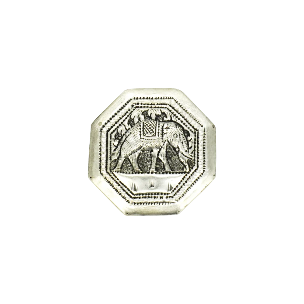 Candle in engraved elephant silver hexagonal box, top view